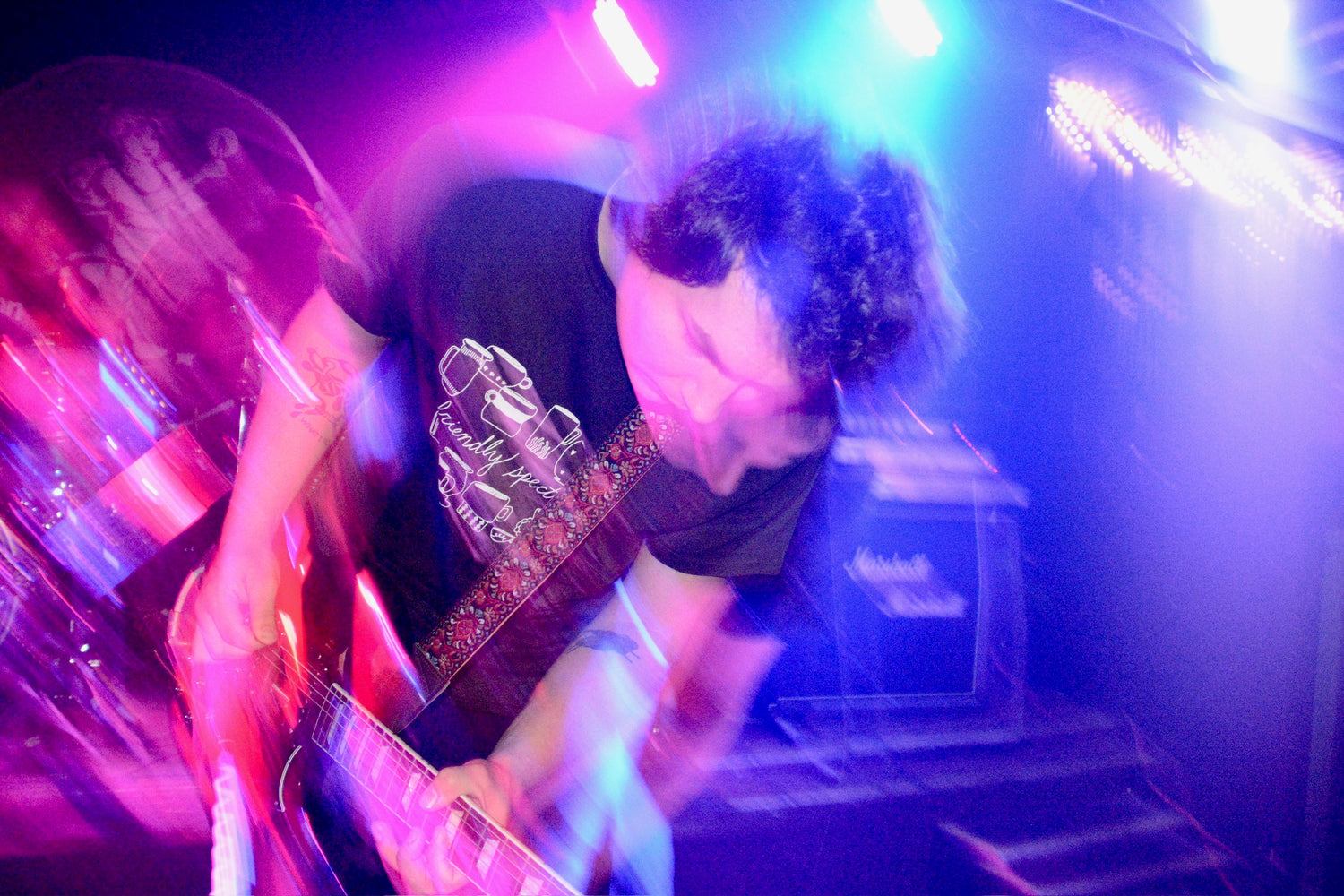 Hayes Noble playing guitar